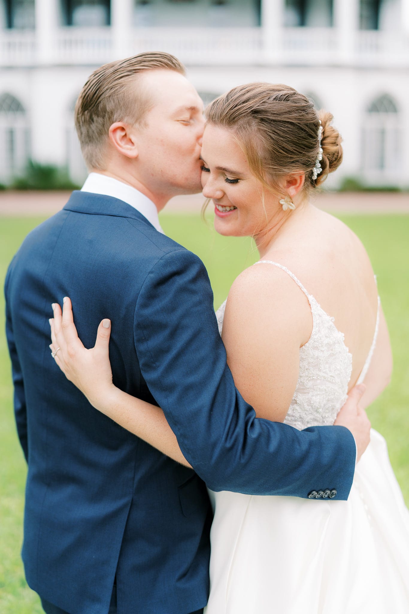 Bride and groom portraits after their first-look at their intimate wedding day at Lowndes Grove